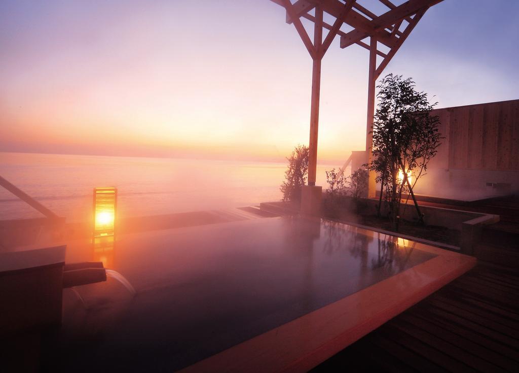 בפו Amane Resort Seikai מראה חיצוני תמונה A view of the outdoor onsen at the Hoshino Resorts Karuizawa Hika